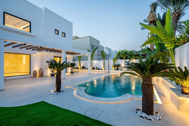 The Meadows villa garden and pool after renovation — new landscaping and pool finish
