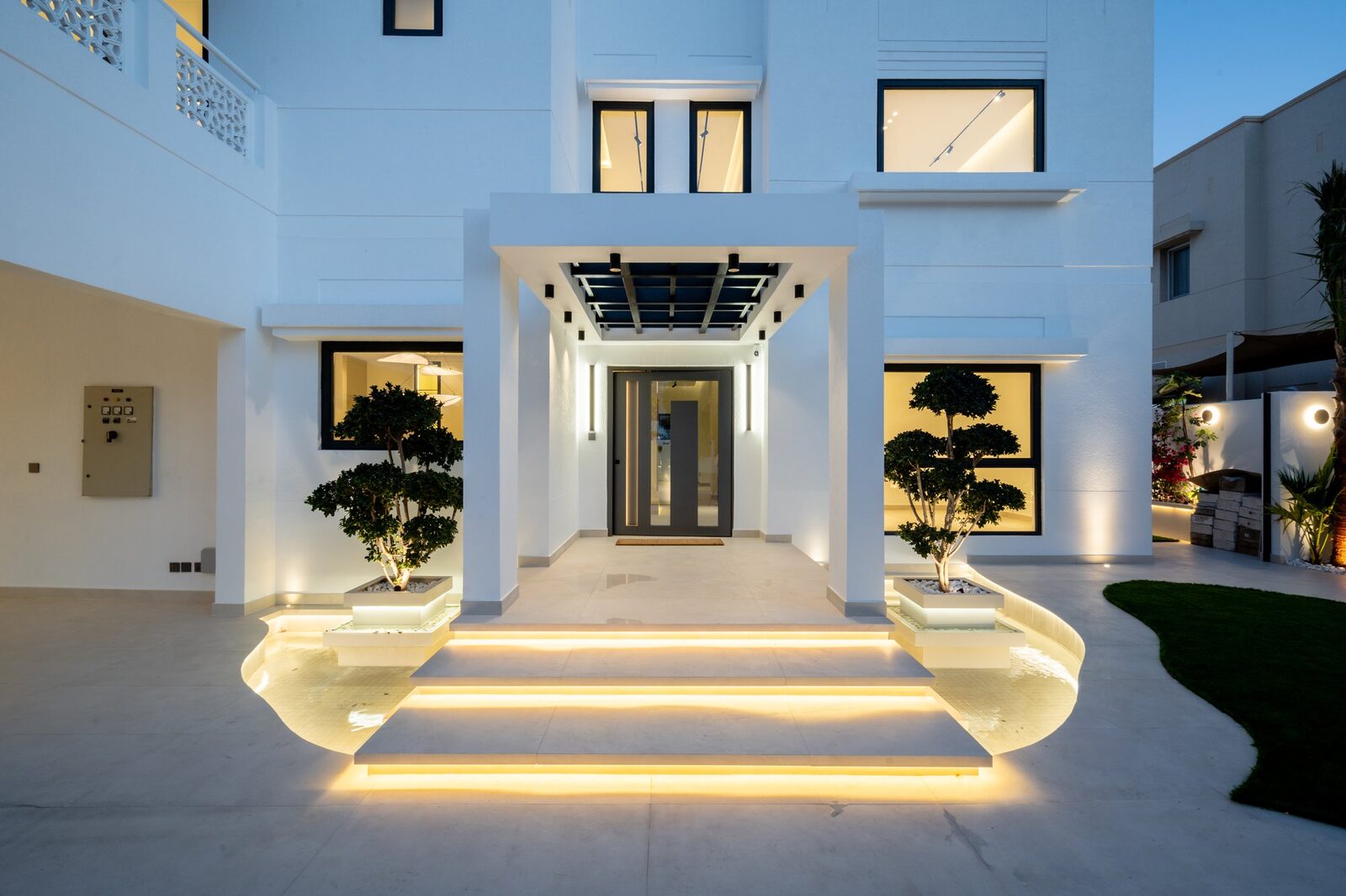 Crownstone-renovated villa entrance in The Meadows, Dubai at twilight