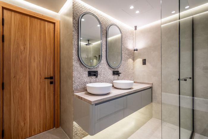 Double Vanity with Oval Mirrors &mdash; completed Crownstone villa renovation, Dubai