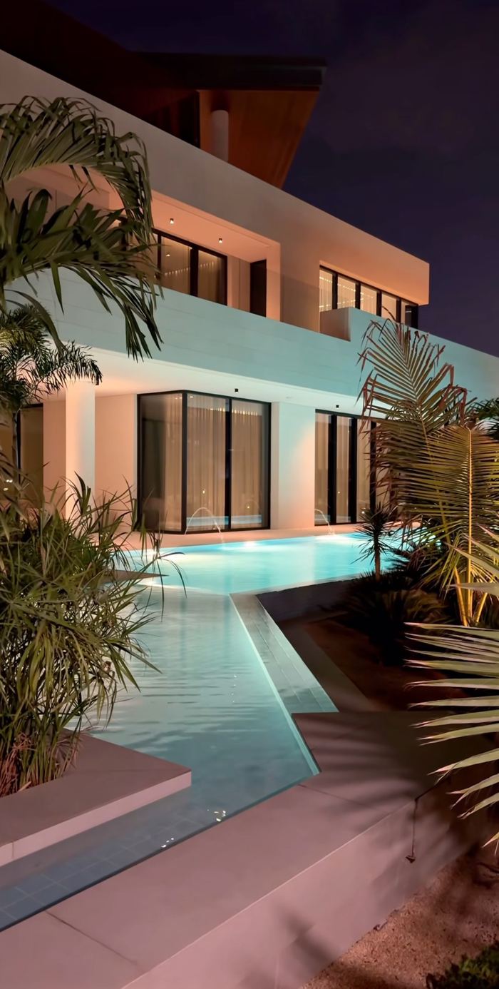 Lap Pool at Dusk &mdash; completed Crownstone villa renovation, Dubai
