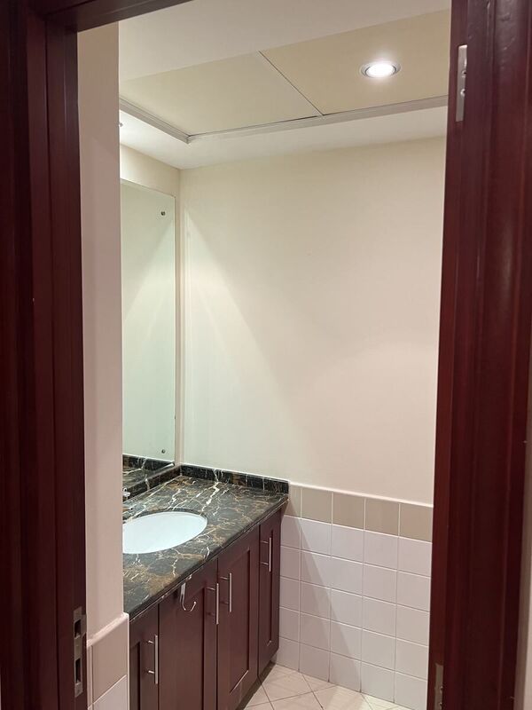 Palmera 4 villa powder room before renovation — original condition