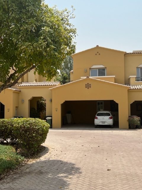 Villa exterior in original, pre-renovation condition, Palmera 4, Arabian Ranches — the kind of dated housing stock investors evaluate for renovation potential in Dubai